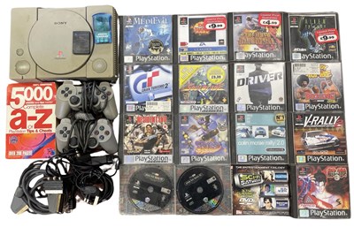 Lot 358 - A Playstation 1 console, with 2 controllers,...