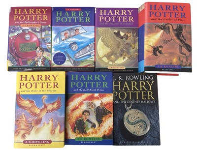 Lot 95 - A set of hardbound Harry potter books, to...