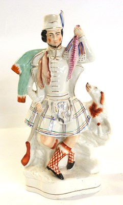 Lot 361 - Staffordshire model of a dancing Highlander,...