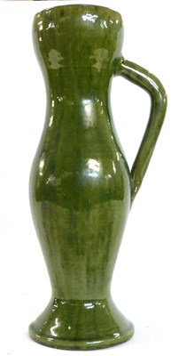 Lot 376 - A green glazed Farnham studio pottery jug...