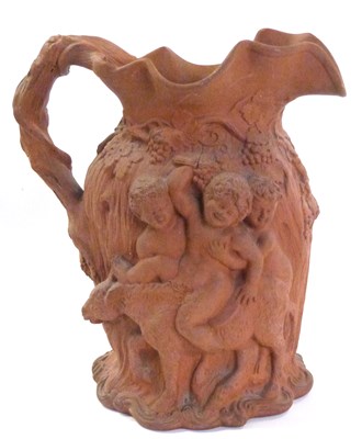 Lot 407 - Large 19th century terracotta jug modelled in...