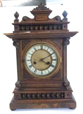 Lot 420 - Early 20th century mantel clock with carved...