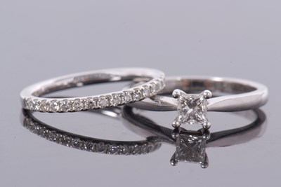 Lot 367 - A platinum diamond solitaire ring and matching...