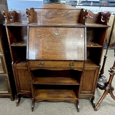 Lot 530 - Late 19th century oak bureau bookcase in the...