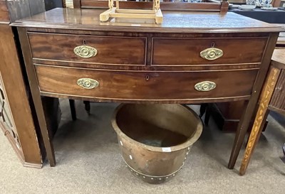 Lot 552 - Georgian mahogany three drawer bow front side...