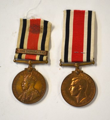 Lot 122 - Two Special Constabulary Service Medals to...