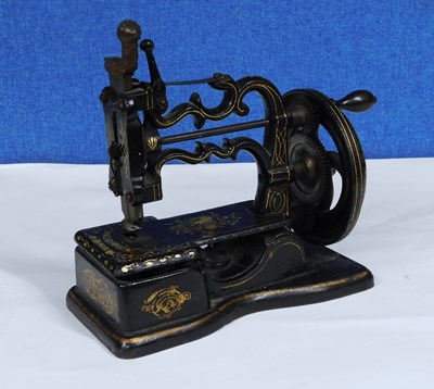 Lot 10 - A late 19th century sewing machine, 'The Globe'...