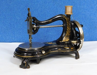 Lot 12 - A c.1879- 1909 sewing machine by Jones,...