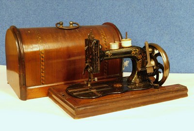 Lot 11 - A late 19th century sewing machine, possibly...