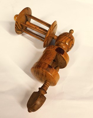 Lot 7 - A 19th century fruitwood sewing clamp thread...