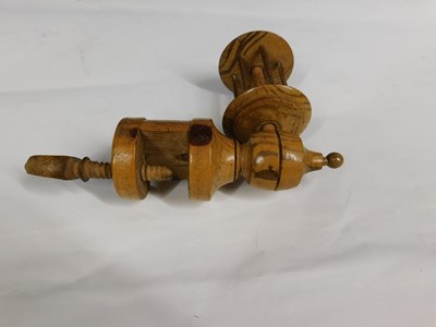 Lot 7 - A 19th century fruitwood sewing clamp thread...