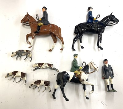 Lot 114 - A collection of Britains huntsmen and dogs...