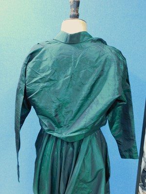 Lot 42 - An emerald green satin evening gown with...