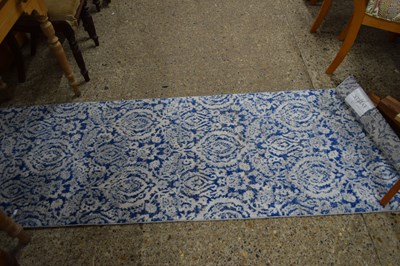 Lot 273 - EVEREK RUNNER CARPET WITH BLUE MARBLED FINISH,...