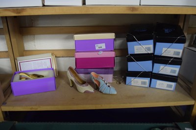 Lot 522 - Quantity of boxed modern shoe ornaments