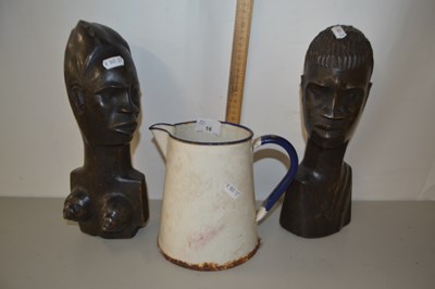 Lot 16 - Pair of African wooden figures and an enamel jug
