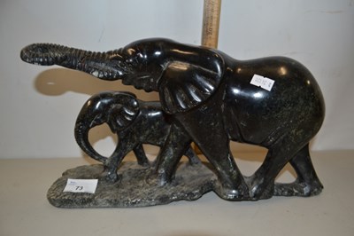 Lot 73 - Polished stone model of two elephants