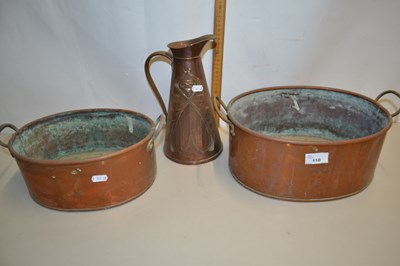 Lot 110 - Copper jug and two oval copper pans