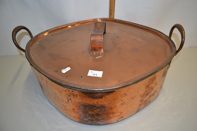 Lot 111 - A large copper covered double handled cooking pan