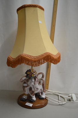 Lot 115 - Pottery table lamp with cow shaped base