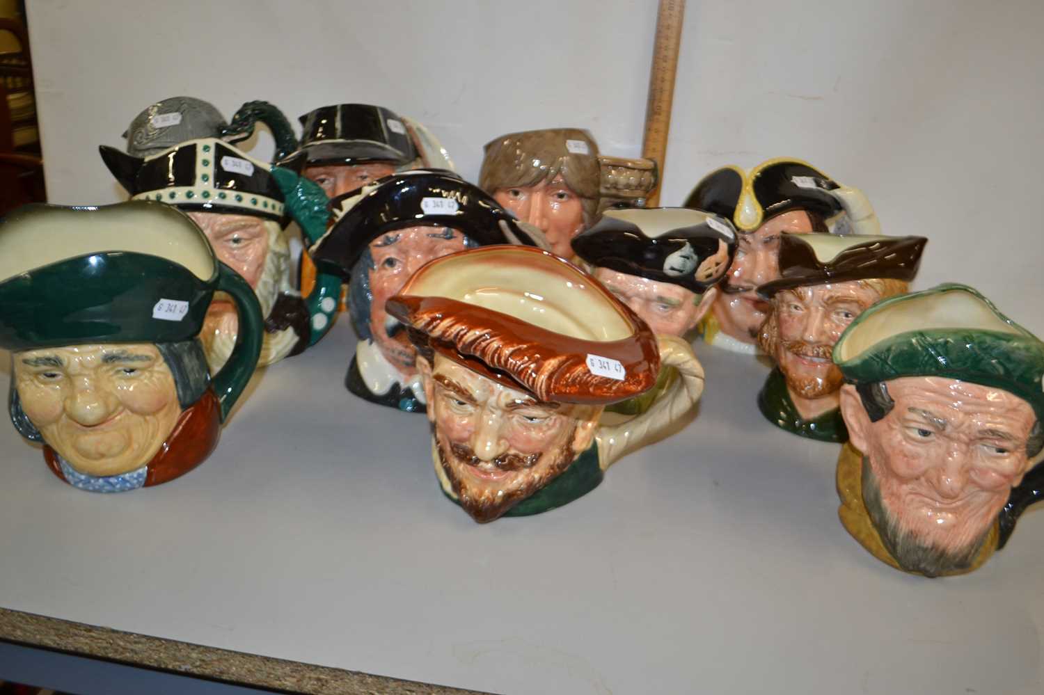 Lot 175 - Collection of Royal Doulton character jugs to...