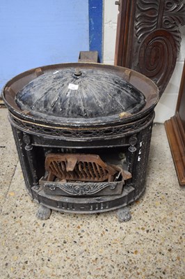 Lot 208 - Large 19th Century cast iron stove of oval...