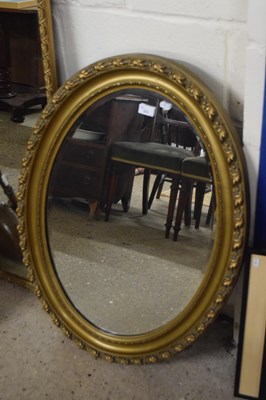 Lot 223 - Early 20th Century oval bevelled wall mirror...