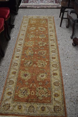 Lot 258 - Modern beige and rust coloured runner carpet,...