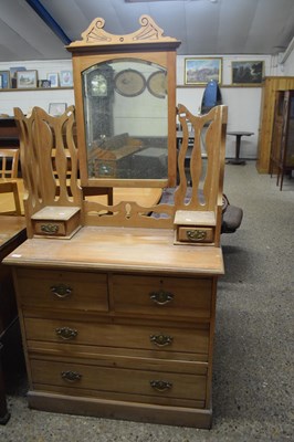 Lot 267 - Late Victorian American walnut mirror back...