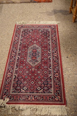 Lot 286 - Small Super Keshan red patterned rug