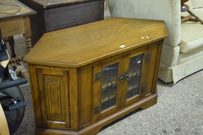 Lot 301 - Reproduction oak corner television cabinet...