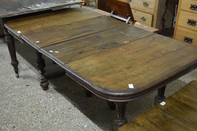 Lot 305 - 19th Century French oak dining table with two...