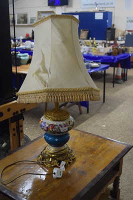 Lot 313 - A table lamp mounted on a gilt decorated base...