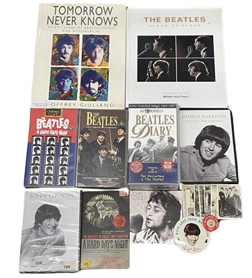 Lot 306 - A mixed lot of Beatles memorabilia, books, VHS...