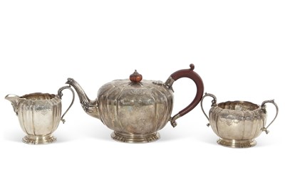 Lot 265 - An Elizabeth II silver three piece tea set...