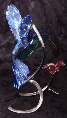 Lot 8 - A Swarovski model of a hummingbird in blue and...