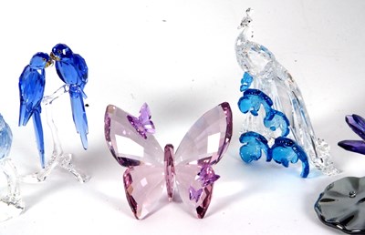 Lot 10 - A group of Swarovski coloured models of a pair...