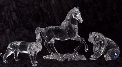 Lot 11 - A Swarovski model of a prancing horse on...