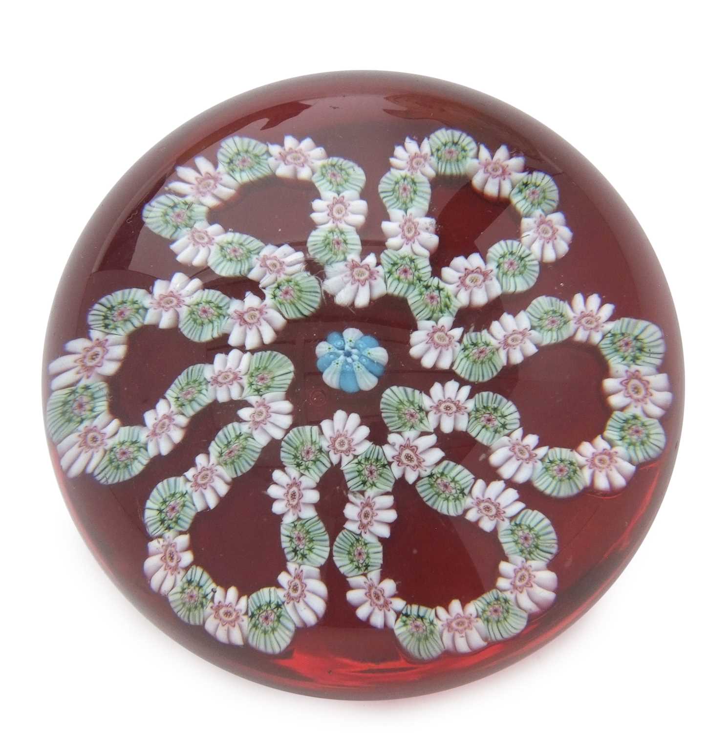 Lot 17 - A Clichy paperweight with a garland of flowers