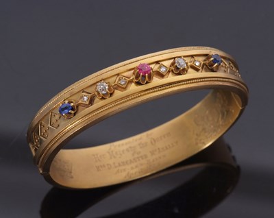 Lot 361 - A Queen Victoria presentation bangle, the...