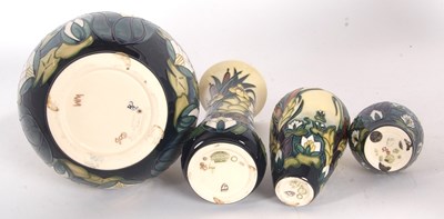 Lot 53 - Group of Moorcroft pottery vases, all with...