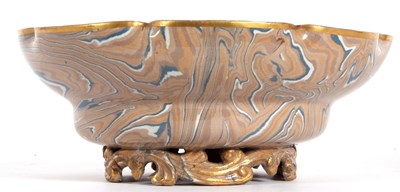 Lot 61 - A large shaped Agate ware bowl by Doulton...