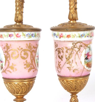 Lot 78 - A pair of 19th century Sevres style candelabra...