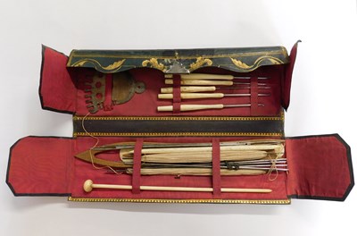 Lot 8 - A leather case of various needlework tools,...
