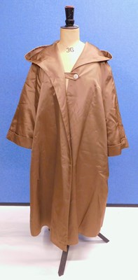 Lot 49 - A lady's mid 20th century brown satin swing...