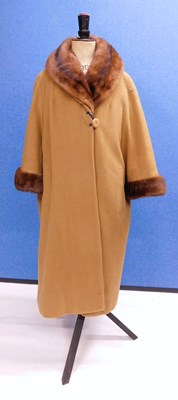 Lot 90 - A lady's cashmere and mink coat by Hutzler's,...