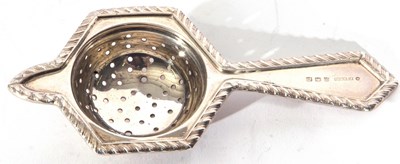 Lot 16 - George V silver tea strainer of hexagonal...