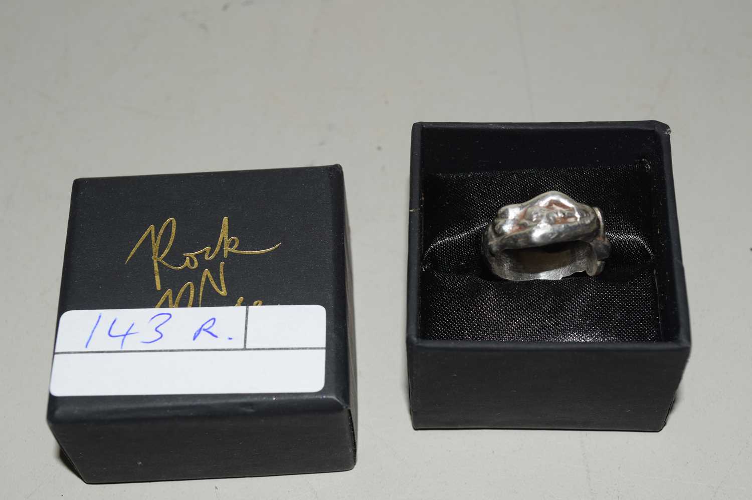 Lot 143 - EROTICA MOULDED RING