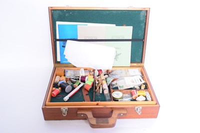 Lot 214 - Case containing various fly fishing tying...