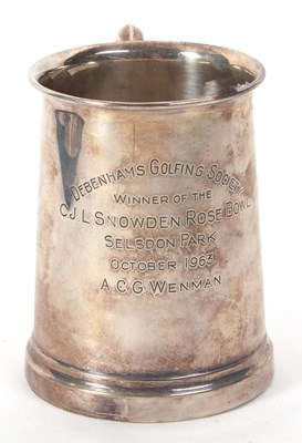 Lot 9 - A hallmarked silver pint tankard of slight...